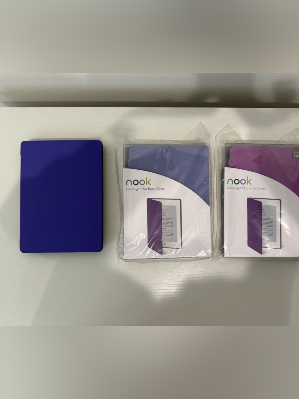 3 Nook GlowLight Plus Book Covers; nook avail in closet. E-readers